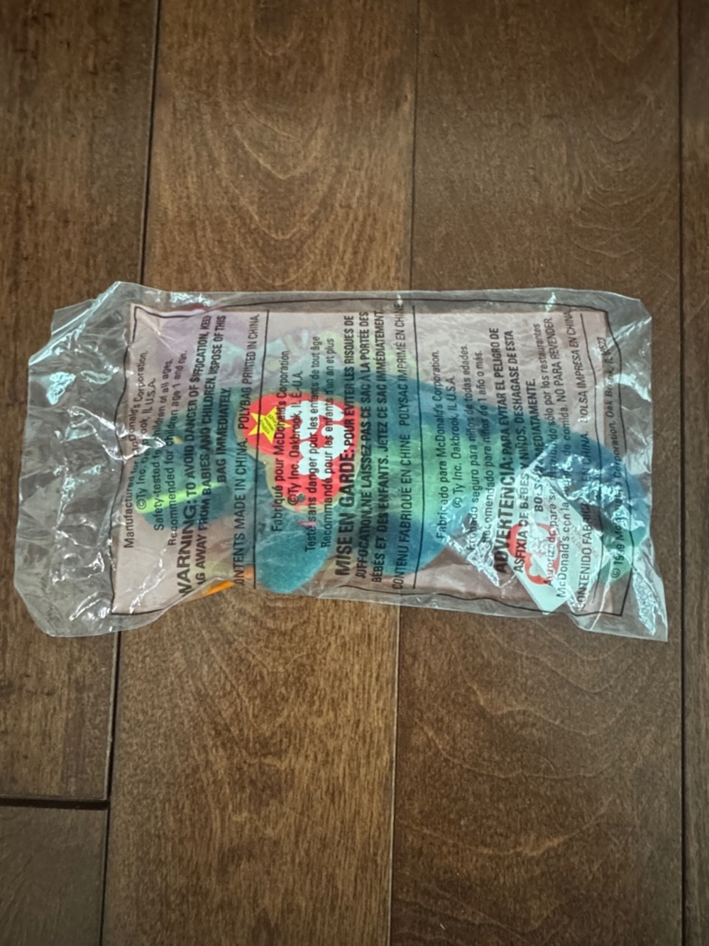 "Ty Teenie Beanie Baby" in original packaging. "Iggy" the Iguana. Rare